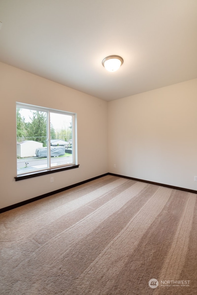 view of carpeted spare room