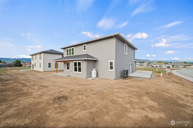 back of house featuring a patio area