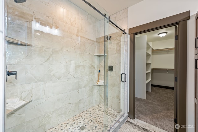 bathroom with an enclosed shower