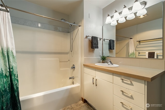 bathroom featuring shower / tub combo, tile flooring, and vanity with extensive cabinet space