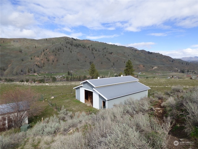 view of mountain feature featuring a rural view