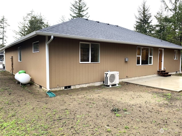 rear view of property with a patio area