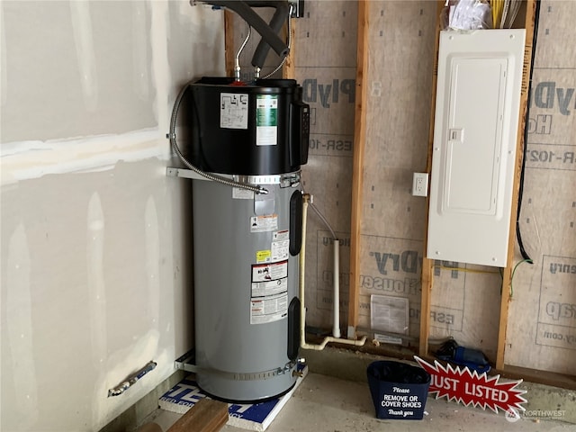 utility room featuring secured water heater