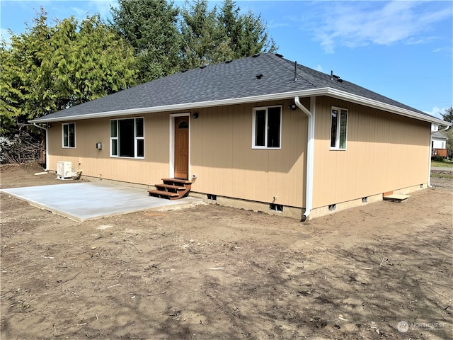 back of house featuring central AC and a patio area