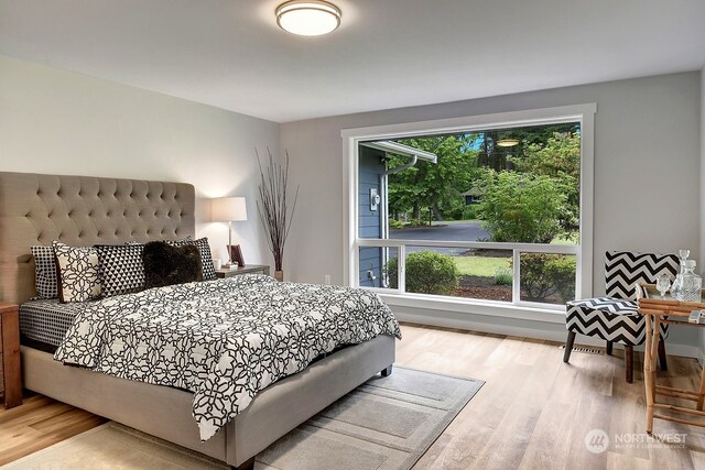 bedroom featuring light wood-type flooring