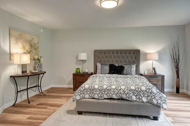 bedroom with light hardwood / wood-style floors