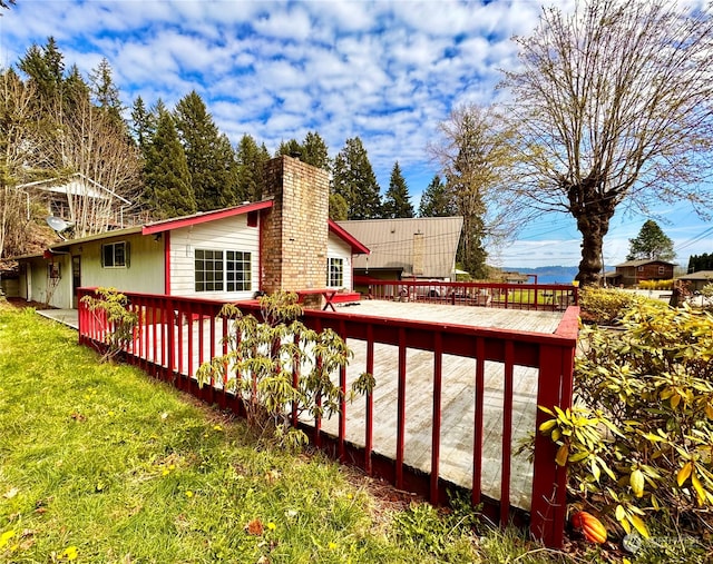 view of property exterior with a yard