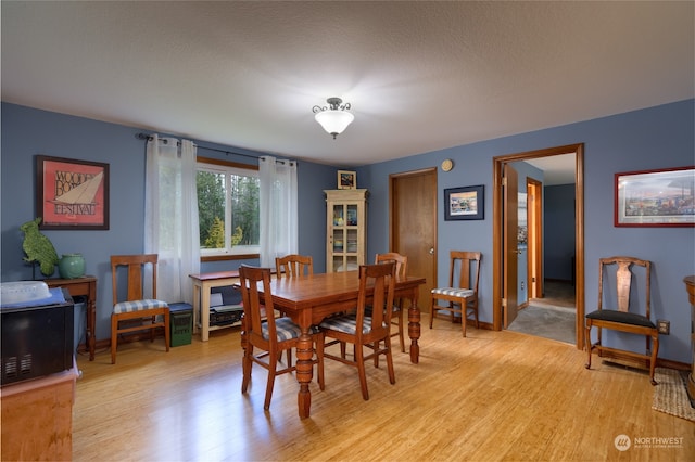 dining room featuring light hardwood / wood-style floors