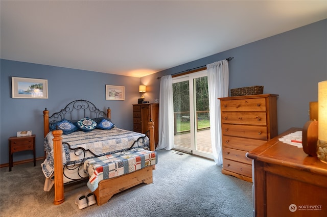 bedroom featuring access to outside and carpet floors