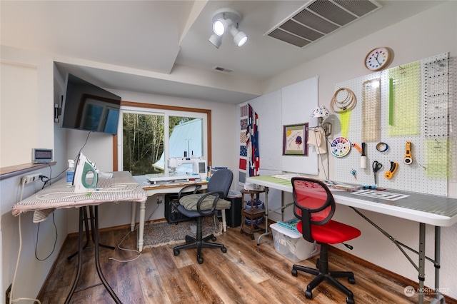 home office featuring hardwood / wood-style floors