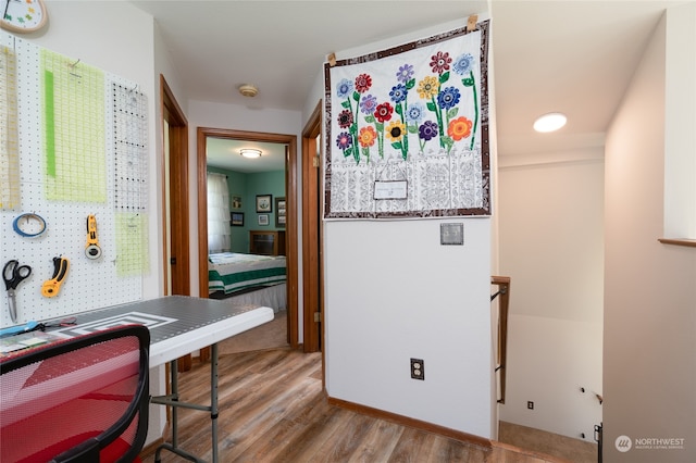 hall with light hardwood / wood-style flooring