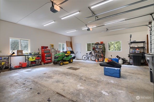 garage featuring a garage door opener