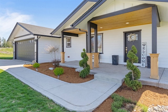 view of front of house featuring covered porch and a garage