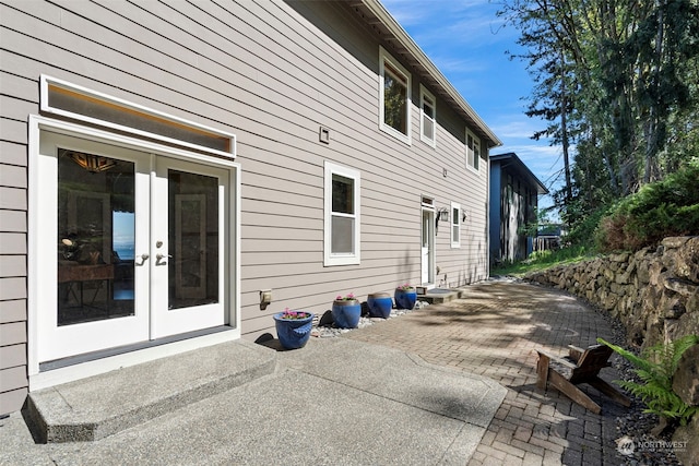 view of home's exterior featuring french doors and a patio