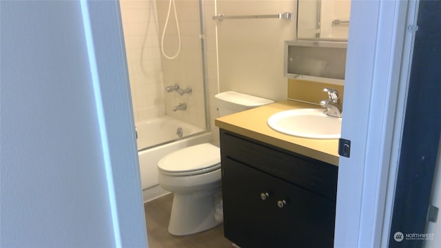 full bathroom featuring vanity, shower / washtub combination, and toilet