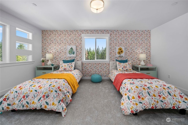 carpeted bedroom featuring multiple windows