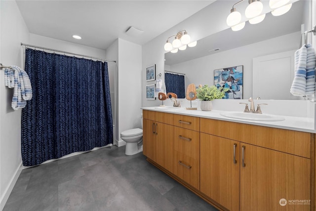 bathroom with vanity, a shower with curtain, and toilet