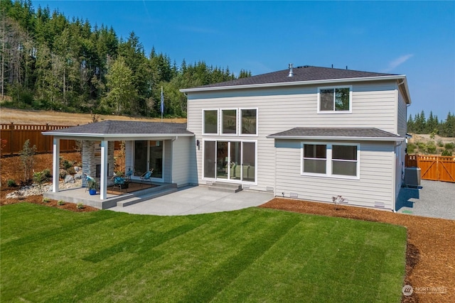 back of house with a yard, a patio, and cooling unit