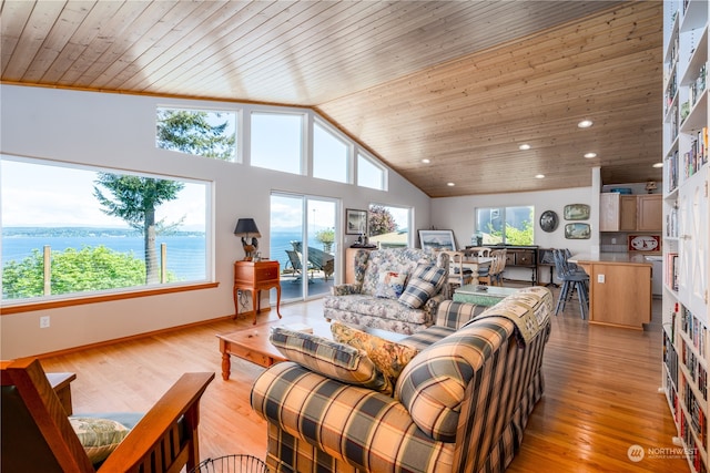 living room featuring high vaulted ceiling, wooden ceiling, light hardwood / wood-style flooring, and a water view