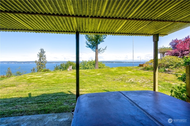 view of patio / terrace featuring a water view