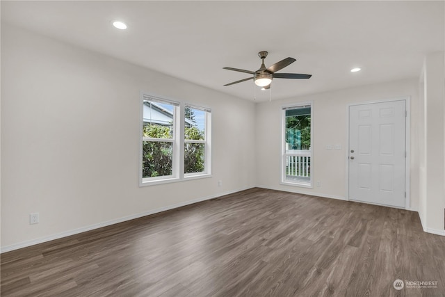 unfurnished room featuring hardwood / wood-style flooring and ceiling fan