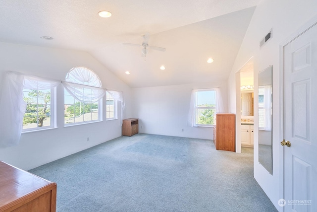 bonus room with ceiling fan, carpet, and vaulted ceiling