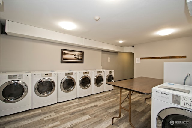 washroom featuring light wood-type flooring and washer and dryer