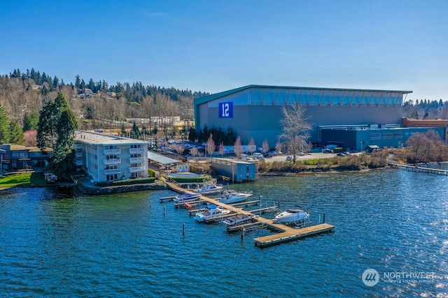 property view of water with a dock