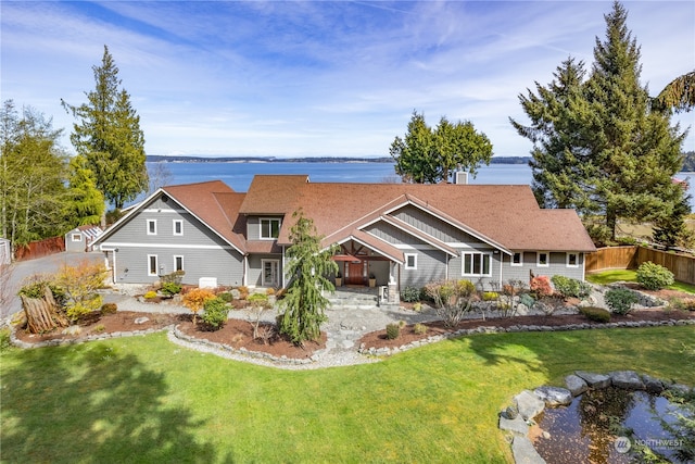 view of front of home with a front lawn