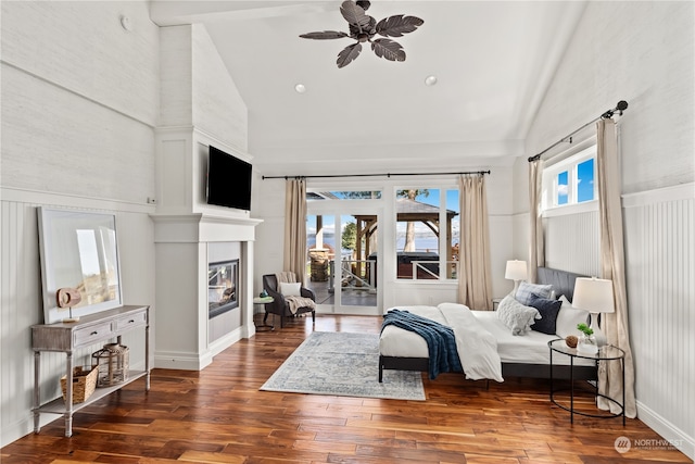 living room with high vaulted ceiling, dark hardwood / wood-style flooring, and ceiling fan