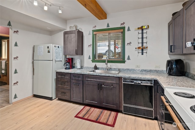 kitchen with white refrigerator, black dishwasher, beam ceiling, and light wood-type flooring