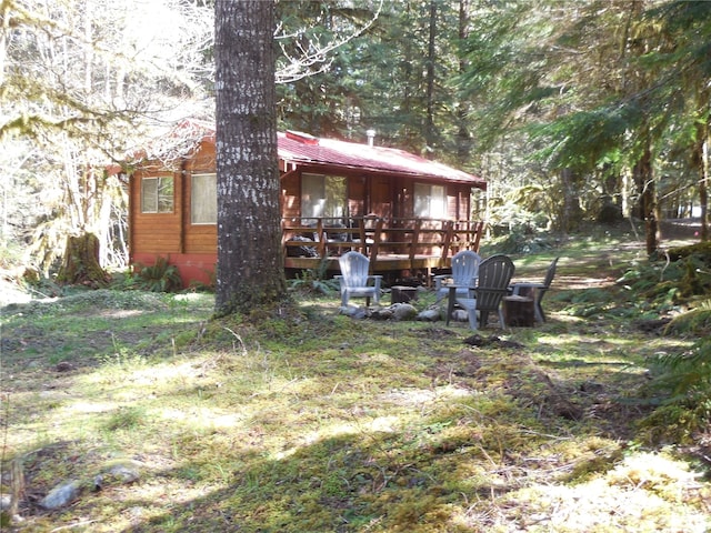 view of yard featuring a deck