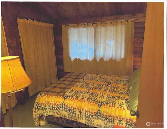 bedroom with wood ceiling