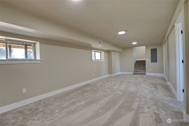 basement with light carpet