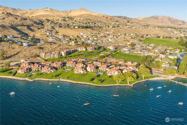 bird's eye view featuring a water and mountain view