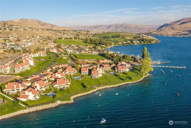 bird's eye view with a water and mountain view