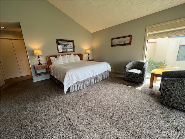 carpeted bedroom with high vaulted ceiling and a textured ceiling