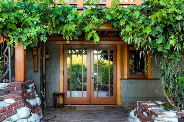 entrance to property featuring french doors