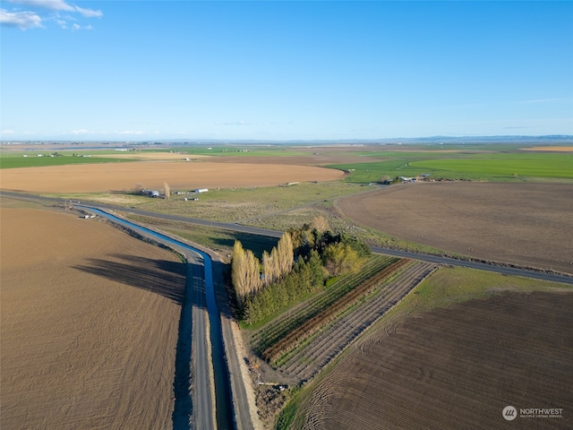 birds eye view of property featuring a rural view