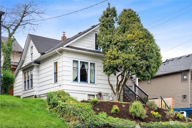 exterior space with a front lawn