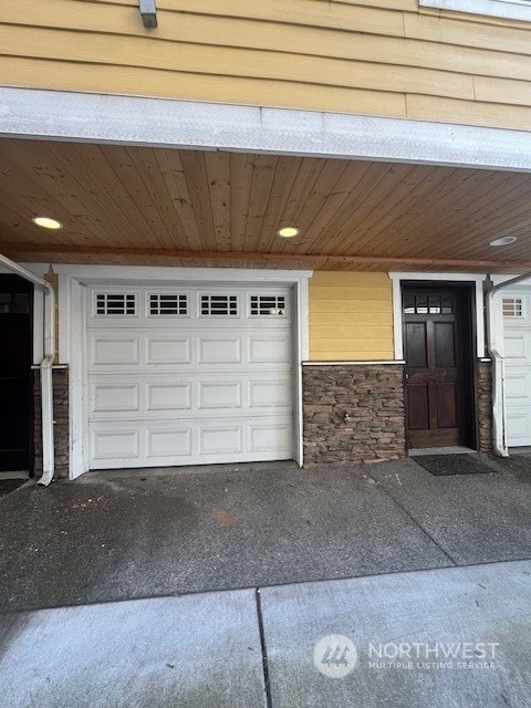 garage featuring wood ceiling