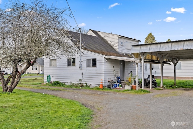 exterior space featuring a lawn