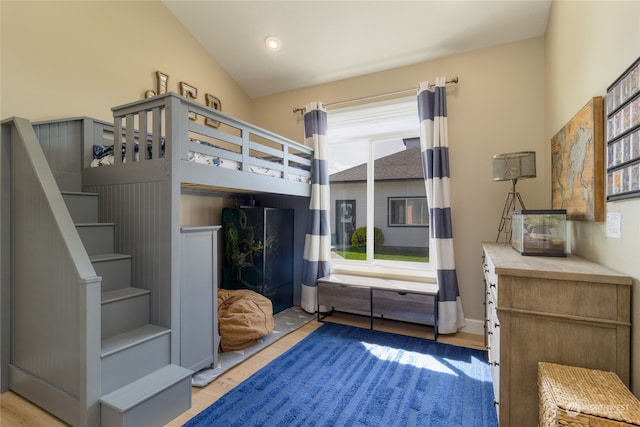 bedroom featuring lofted ceiling