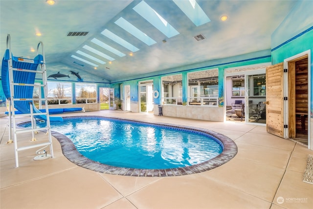 view of pool with a skylight