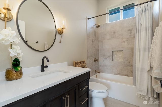 full bathroom with vanity, toilet, and shower / bath combo