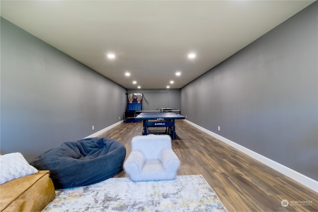 rec room with dark hardwood / wood-style flooring