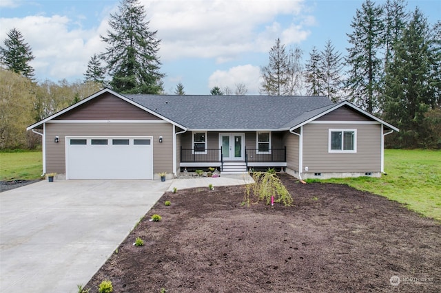 single story home featuring a front lawn, covered porch, and a garage