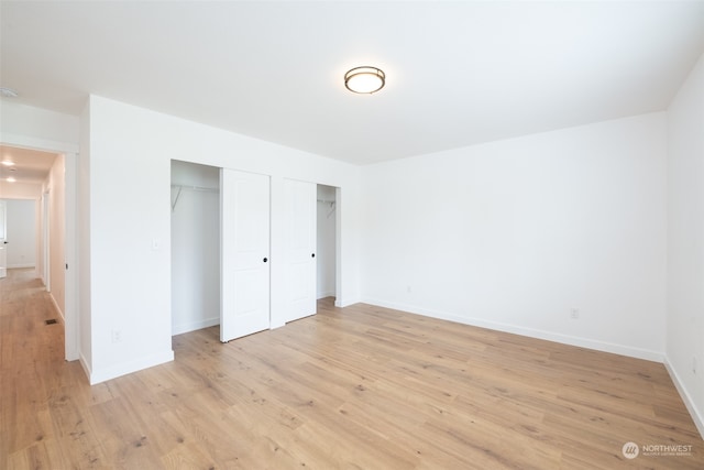 unfurnished bedroom featuring light hardwood / wood-style floors