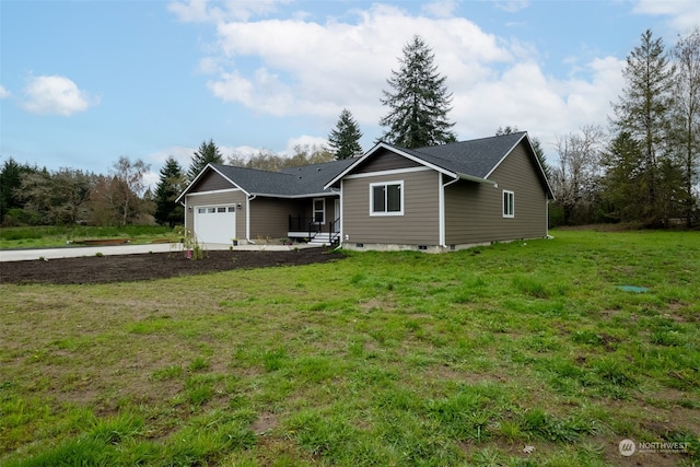 single story home with a garage and a front yard