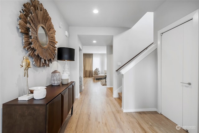 hallway featuring light wood-type flooring